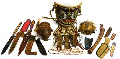 Lot 444 - A Chokwe Pwo Mask, of small proportions, with woven vegetable fibre coiffeur set with cowrie...