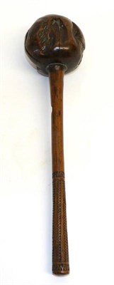 Lot 448 - A 19th Century Fijian Ula (Throwing Club), the globular head with seven natural crevices, the...