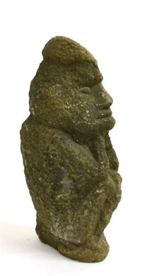 Lot 454 - A Carved Stone Figure, Possibly 19th Century Oceanic, seated in a squatting position, its...