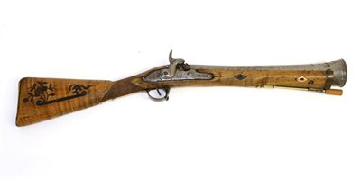 Lot 545 - A Percussion Blunderbuss, the steel barrel with wire inlay and chiselled decoration, the lock...