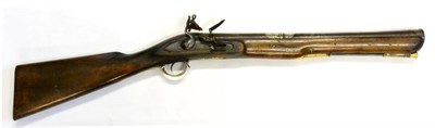 Lot 556 - A 19th Century Indian Flintlock Blunderbuss, the 49.5cm iron barrel octagonal at the breech, inlaid