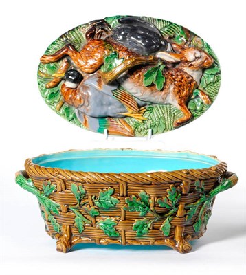 Lot 39 - A Majolica Game Pie Dish and Cover, probably Minton, circa 1860, of twin-handled oval form, the...