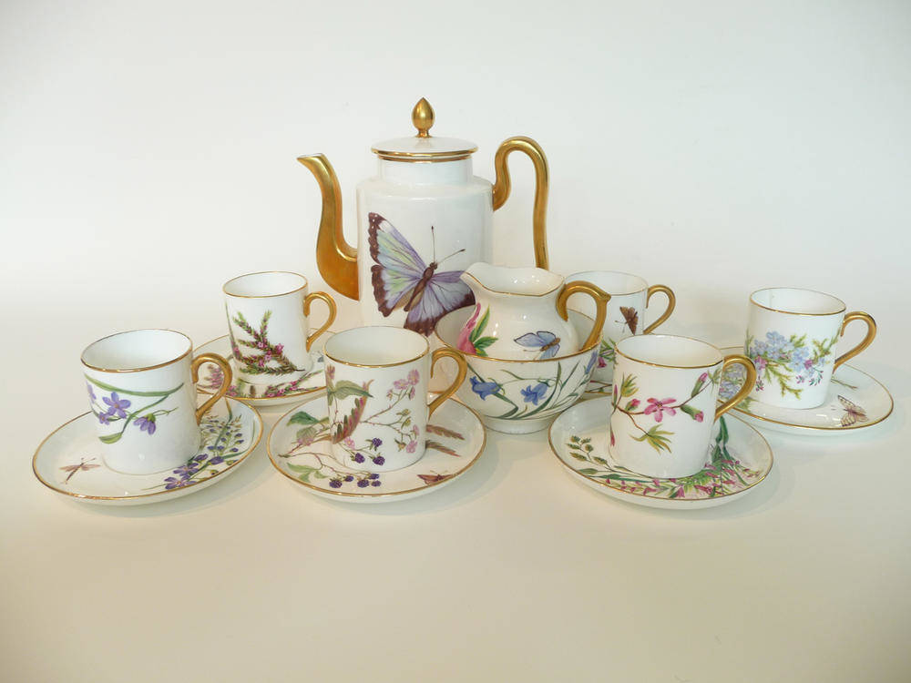 Lot 40 - A Coalport Porcelain Coffee Service, late 19th century, painted with insects and foliage within...