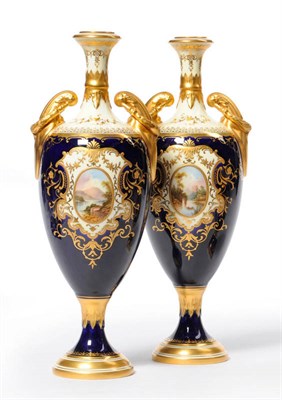 Lot 41 - A Pair of Coalport Porcelain Slender Urn Shaped Vases, circa 1900, with wreath and scroll...