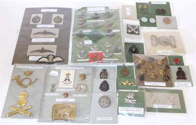 Lot 77 - The Durham Light Infantry :- a collection of cap badges, buttons, embroidered cloth shoulder...