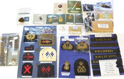 Lot 122 - Militaria, including a display of Royal Navy cap tallies, Royal Navy, Merchant Navy and...