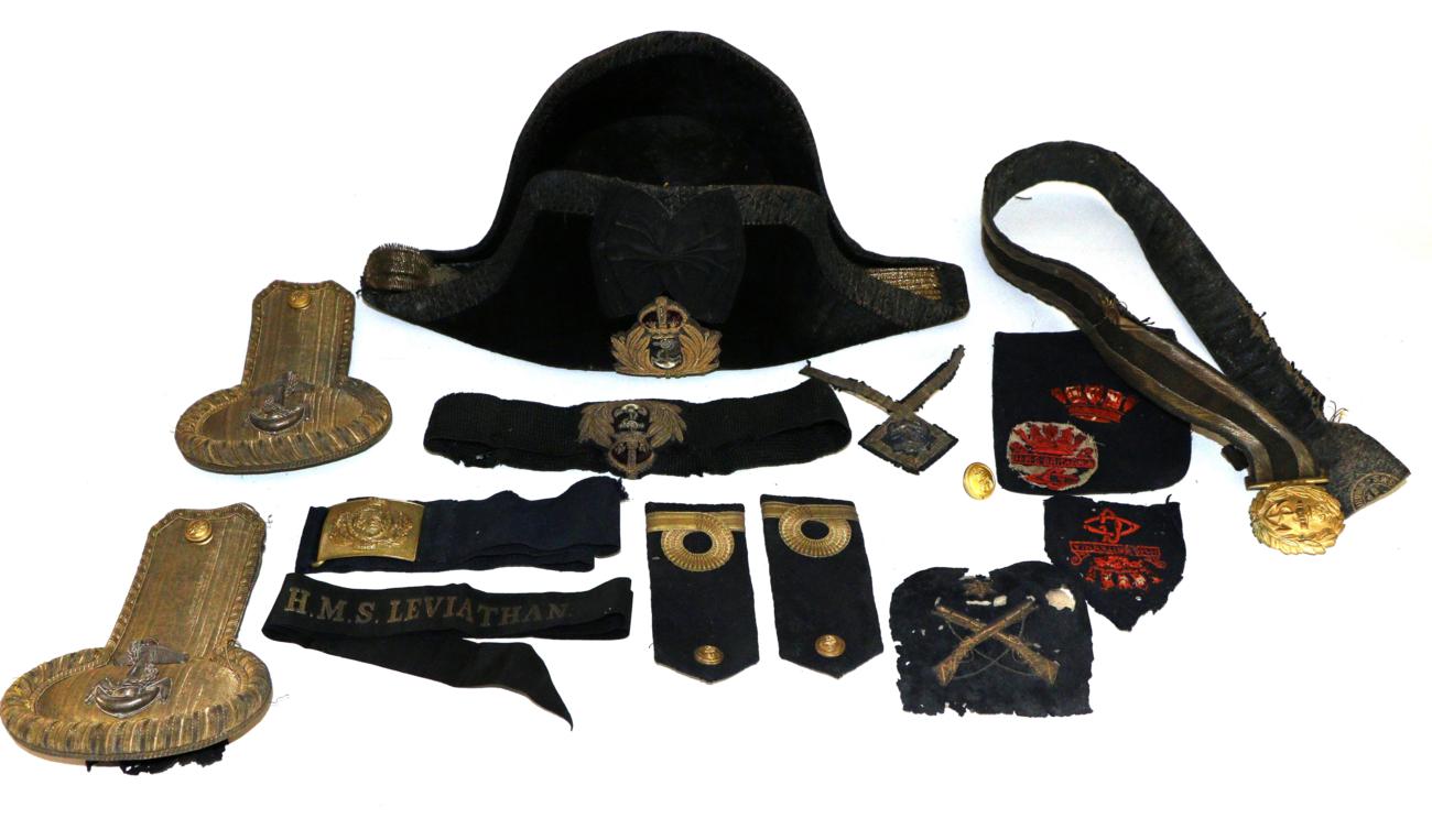 Lot 186 - A Collection of Royal Navy Uniform and Accoutrements, including a bicorn hat, by Gieve,...