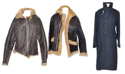 Lot 188 - A Second World War Sheepskin Flying Jacket, the cuffs with original Dot zips, vented underarms,...