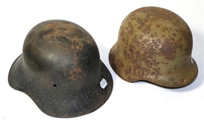 Lot 206 - A German Third Reich M1940 Army Helmet, with desert camouflage, the left inner brim stamped...