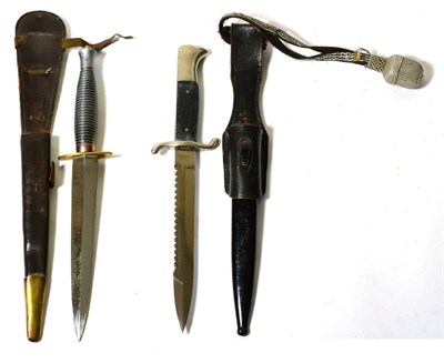 Lot 229 - A German Third Reich Fireman's Parade Dagger, the saw-back blade stamped with maker's logo and...