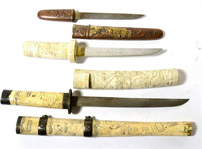 Lot 240 - A Meiji Period Japanese Tanto, the 13cm steel blade with one piece brass habaki, the copper...