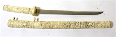 Lot 242 - A Japanese Wakizashi, circa 1900, the 30cm steel blade with one piece brass habaki, the...