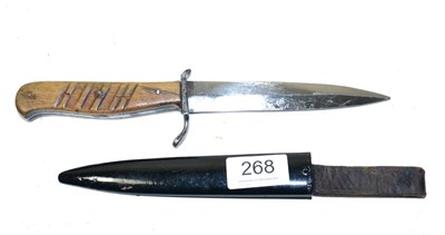 Lot 268 - A Second World War German Trench Knife, with 13.5cm single edge blade double edged at the tip, with