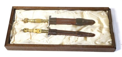 Lot 288 - A 20th Century German Dagger, with etched ";High Life"; blade, recurving steel crossguard and...