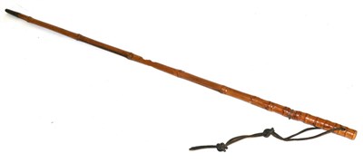 Lot 290 - An Early 19th Century Bamboo Sword Stick, the 75.5 cm fullered, triangular section steel blade...