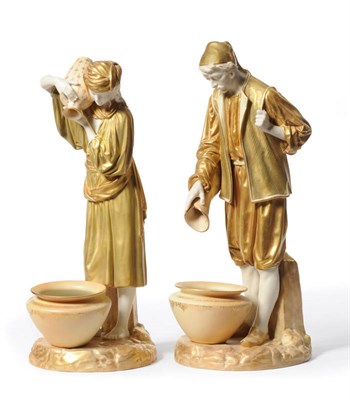Lot 65 - A Pair of Royal Worcester Porcelain Figures of Water Carriers, 1923 and 1924, he wearing a...