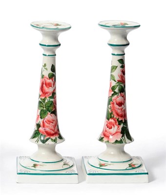 Lot 69 - A Pair of Wemyss Pottery Candlesticks, circa 1910, of tapering cylindrical form on square...