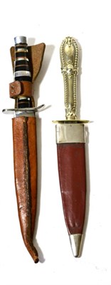 Lot 381 - A Victorian Prostitute's Dagger, the 11.5cm double edge steel blade with raised medial ridge to...