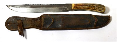 Lot 382 - A 19th Century Bowie Knife, the 26.5cm single edge saw back clip point steel blade stamped with...