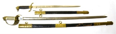 Lot 389 - A Copy of a British Naval Dirk, with brass mounted leather scabbard; a Copy of a Naval Sword,...