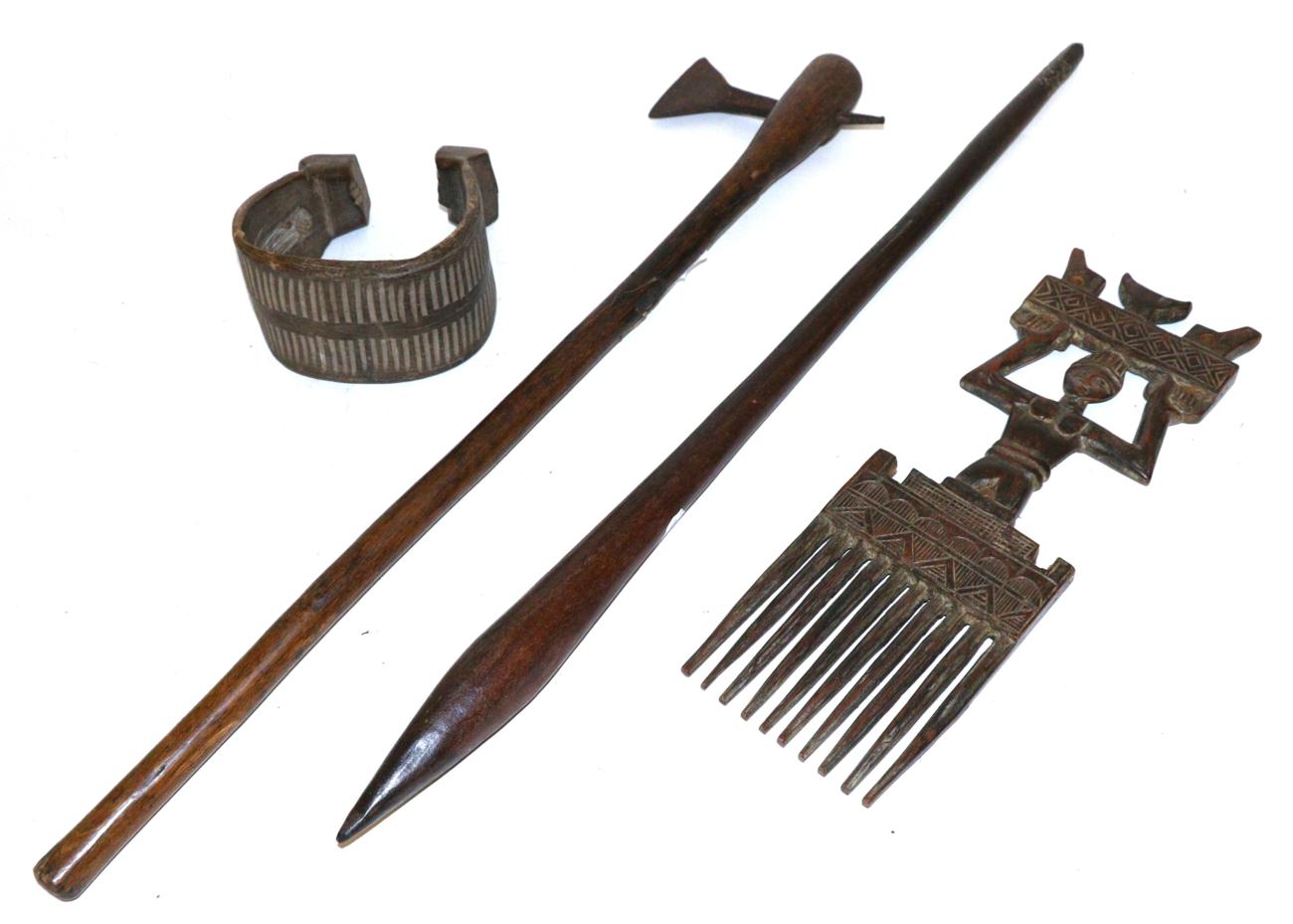 Lot 400 - A 19th Century Australian Aboriginal War Club, with pointed ovoid head and tapering haft with scale