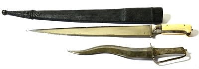 Lot 407 - An Indian Khyber Knife, the 39 cm steel blade of T-shaped profile, the steel hilt with polished...