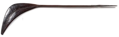 Lot 410 - A Mid 19th Century Solomon Islands Dance Club, of rich dark brown patinated wood, the sickle...