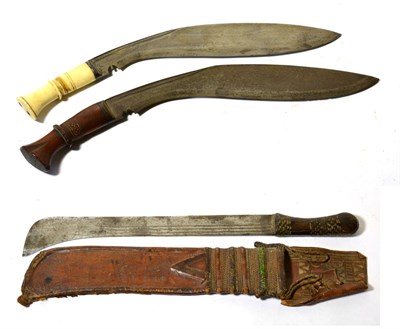 Lot 415 - A Sudanese Short Sword, the machete type blade with hooked tip and triple fullers, with leather...