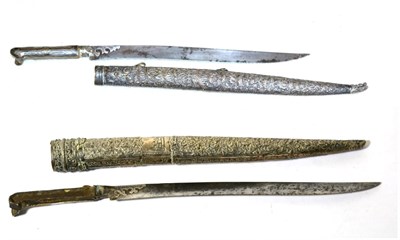 Lot 418 - A 19th Century Ottoman Bichaq, with 35cm yataghan steel blade, silver overlaid ricasso and...