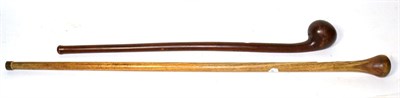 Lot 420 - A Zulu Knobkerrie, of rich chestnut coloured wood, with offset globular head and tapering haft,...