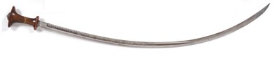 Lot 423 - An Early 20th Century Ethiopian Sword (Shotel), the 94 cm long, curved, single edge blade with part