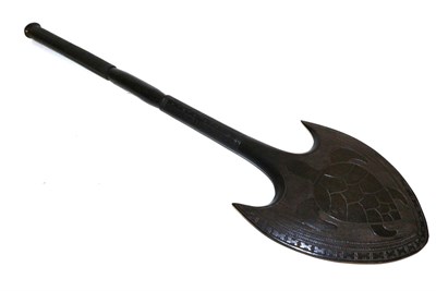 Lot 434 - An Indonesian Ebony War Club, possibly Trobriand Islands, the large spade shape head carved...