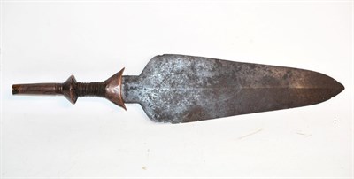 Lot 435 - A Kuba Knife, DRC, the 39cm broad leaf shape blade with slightly raised medial ridge, the...