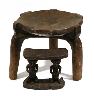 Lot 437 - A Senufo, West Africa Wood Stool, made from one piece of wood, the dished circular seat with...