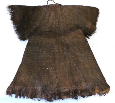 Lot 442 - A 19th/20th Century Polynesian/Indonesian Warrior's Jacket, of woven palm fibre, with rolled...