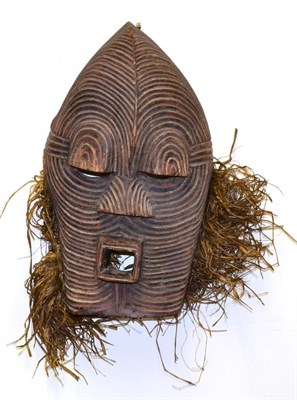 Lot 452 - A Songye Female Kifwebe Mask, DRC, the domed forehead with slightly raised crest, hooded eyes,...