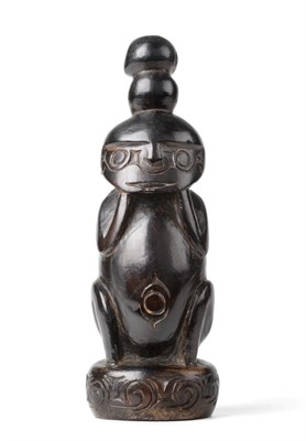 Lot 463 - A Late 19th/20th Century Dark Hardwood Ancestor Figure, possibly Lake Sentani, Northern Coast...