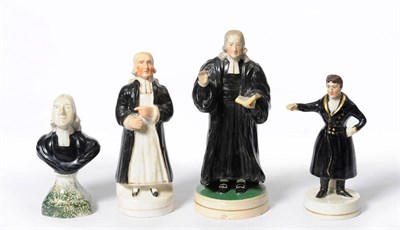 Lot 93 - A Staffordshire Pottery Figure of Wesley, mid 19th century, standing holding a bible in his...