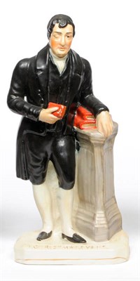 Lot 96 - A Staffordshire Pottery Figure of the Rev Christmas Evans, 19th century, wearing black jacket...
