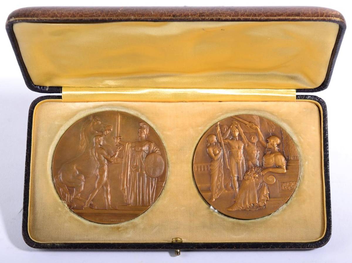 Lot 24 - Two First World War Italian Historic Bronze Medals :- one cast with an allegorical scene of a naked