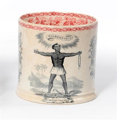 Lot 98 - A Staffordshire Pottery Anti-Slavery Mug, circa 1830, printed in black with a slave released...