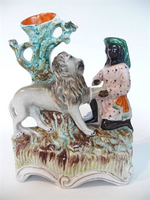 Lot 99 - A Staffordshire Pottery Spill Vase, circa 1870, as Daniel removing a thorn from a lion's paw,...