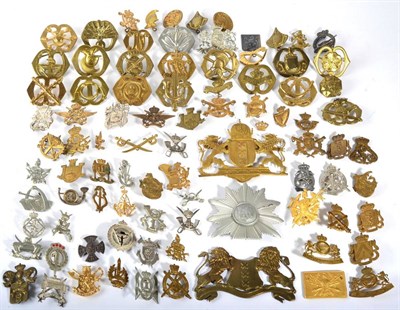 Lot 51 - A Collection of  Approx. 55 Belgian Cap Badges and Helmet Plates, mainly brass and plated examples