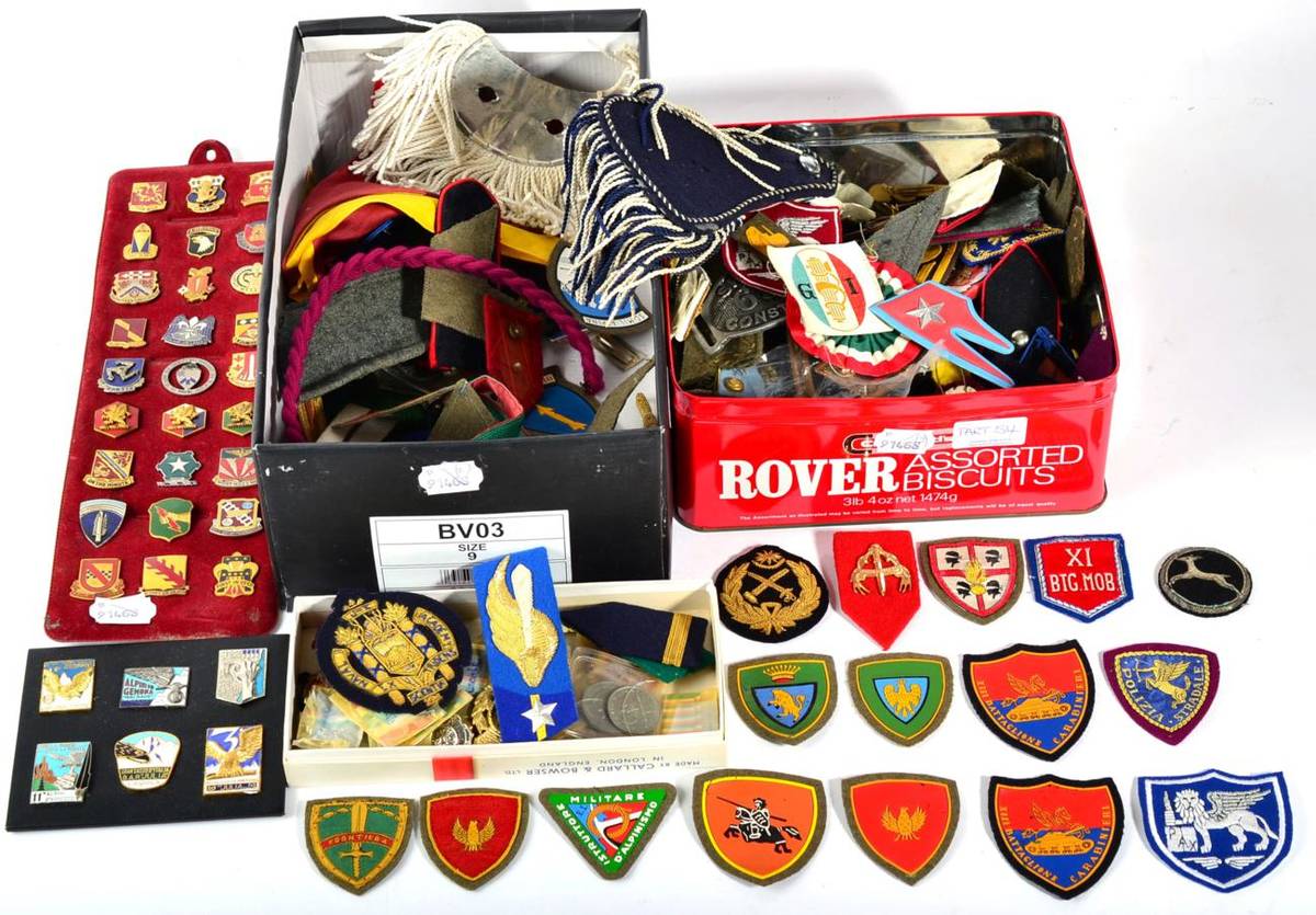 Lot 54 - A Miscellaneous Collection of Militaria, including formation badges, rank stripes, US...
