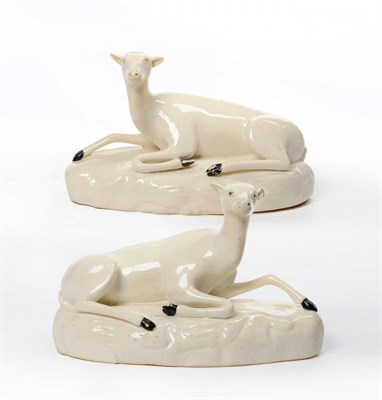 Lot 103 - A Pair of Brameld Porcelain Models of a Recumbent Stag and Doe, circa 1820, after Chinese...