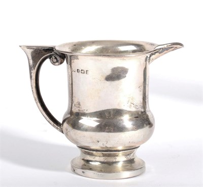 Lot 104 - A George V Small Silver Cream Jug, of baluster form, engraved with the RFC badge and 'MICHAEL',...