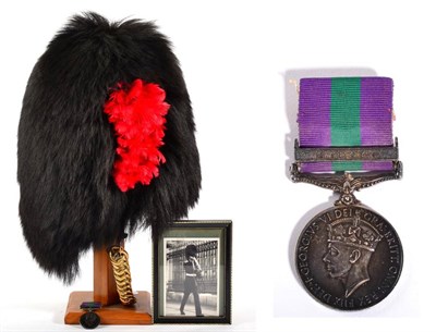 Lot 115 - A Coldstream Guards Other Ranks Bearskin Cap, with wicker cage frame, leather liner, maker's...