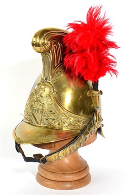 Lot 116 - A Copy of a French Cuirassier's Brass Helmet, with raised fluted comb, a crimson plume set to...