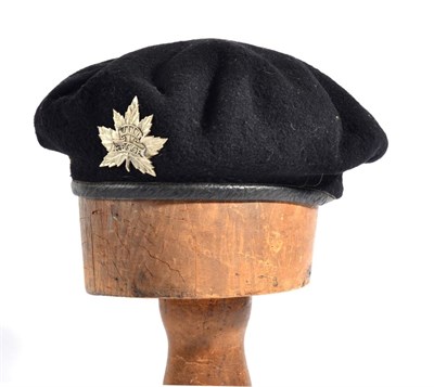 Lot 118 - A Second World War Canadian Special Forces Kangol Beret, dated 1945 and with rare white metal RECCE