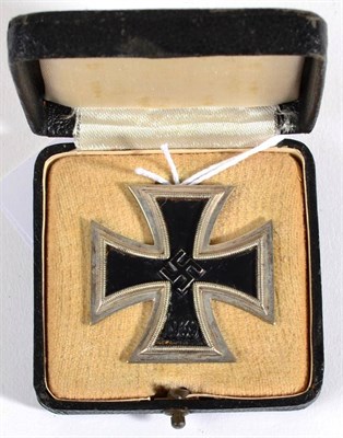 Lot 128 - A German Third Reich Iron Cross, 1939, first class, with sword shape pin stamped L/13, in...
